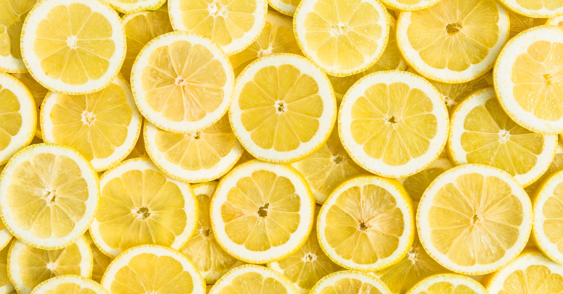 Sliced lemons laid flat ready to be used for cleaning